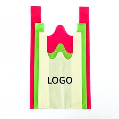 China Reusable Multi Colors Nonwoven Shopping Vest Bags T-shirt Grocery Bags With Reusable Handles And Disposable Supermarket Logo Custom Bag for sale