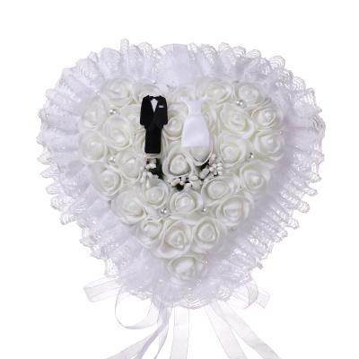 China Unique Romantic White Wedding Heart Ring Pillow Cushion Bearer for Beach Wedding Lace Flower Canvas Ring Holder for sale