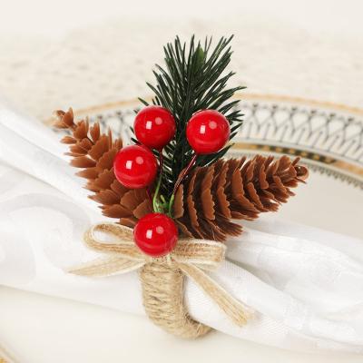 China Viable Artificial Pine Cone Berries Christmas Napkin Rings Stand Handwork Christmas Banquet Party Decoration for sale