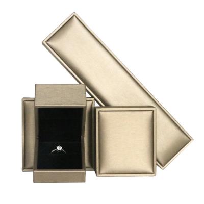 China Custom Eco-friendly.Handmade Gold PU Leather Jewelry Packaging Box Ring Necklace Box Jewelry Box for sale