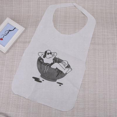 China Disposable Nonwoven Waterproof Oil-proof And Splash-proof Kitchen Apron Gown for sale