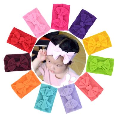 China European and American Headwear bow headband baby hair style baby head bands soft elastic nylon headbands big with bow for sale