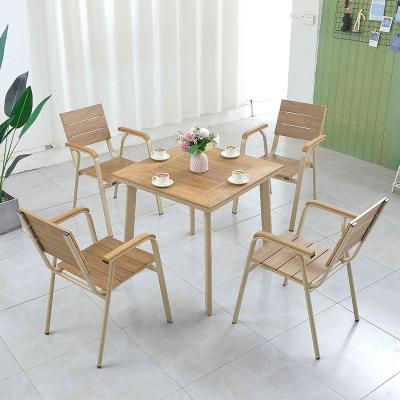 China Outdoor Water Proof Multicolor Optional Patio Table And Plastic Wood Chair Set for sale