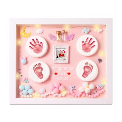 China 2021 Modern simplicity hot-selling baby clay footprint kit hand and foot printing ink pad photo frames for wholesale for sale