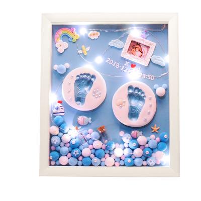 China Modern Simplicity 0-3 Year Old Baby Keepsake Hand and Foot Pad Photo Frame Newborn Hand and Foot Print Photo Frame for sale