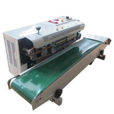 China Food Mini Automatic Continuous Film Sealing Machine Coffee Bag Strip Sealer with Coder with Counter for sale