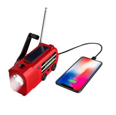 China PORTABLE Solar Hand Crank AM Noaa FM 5000mah Time Emergency Rechargeable Portable Radio with Reading Light and Cell Phone Charger for sale