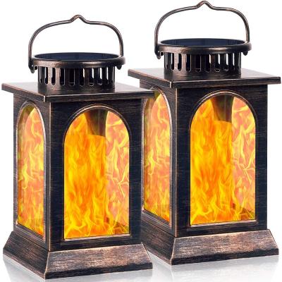 China Outdoor Indoor Garden Flame Hanging Larger Waterproof Metal Solar Panel Lantern Candle Lights for Garden Christmas Decoration Lights for sale