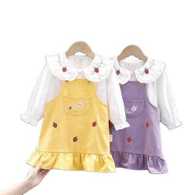 China OEM 2021 children's autumn clothing doll collar print shirt strap casual dress set two pieces of suspender skirt for sale