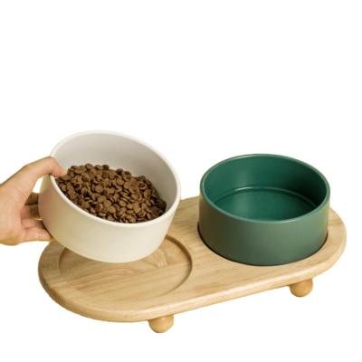 China Amazon Sustainable Hot Selling Ceramic Pet Double Feeding Watering Bowl With Wooden Base for sale