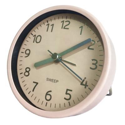 China Colorful Antique Style Mini Round Metal Travel Analog Alarm Clock with Folding Stand for sale