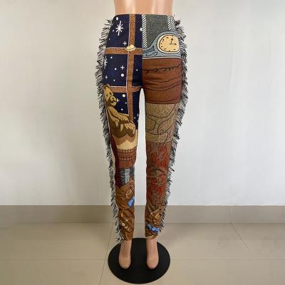 China Anti-pilling women's hippie tassel graphic printed to pattern straight pants elastic ninth pants party music festival wear for sale