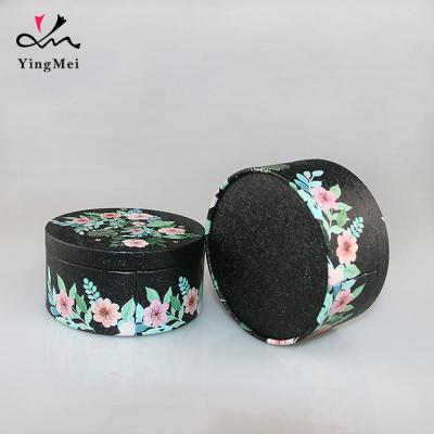 China Hot Sale Custom Black Yingmei Round Tin Box Metal Tea Container Packaging Recyclable With Slip Cover for sale