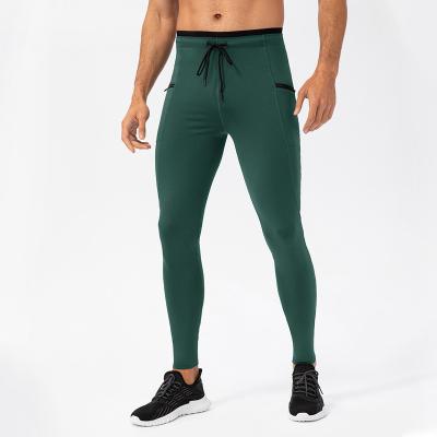 China Wholesale Customized QUICK DRY Workout Fitness Sports Pants Slim Jogging Fitness Sports Pants Men Pocket Zipper Quick Dry Stretch Pants for sale