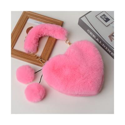 China 2022 fashion lady winter plush purse holding china plush peach handbag women heart-shaped handbags for sale