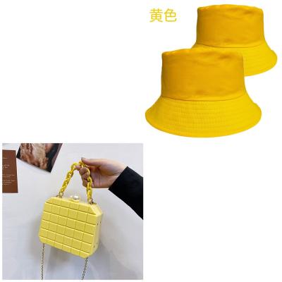 China 2021 Custom Women PVC Bucket Hat Mommy And Me Acrylic Chain Purses Purse And Hat Sets for sale