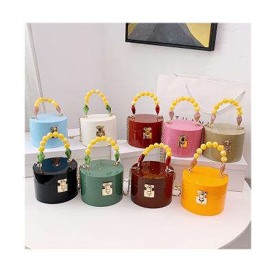 China Fashion Mini Acrylic 2021 Summer Designer Luxury PVC Box Handbag Fashion Beaded Handle Purse Candy Color Round Lady Bags for sale