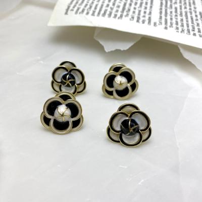 China BOHEMIA Fashion Black And White Camellia Flower Stud Earrings For Women Ladies for sale