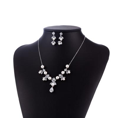 China Luxury Romantic Water Drop Crystal Wedding Necklaces And Earrings Pearl Set Bridal Jewelry Set For Women for sale