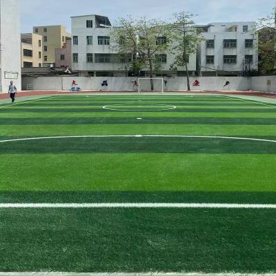 China Durable S shape yarn Bi-green infilling soccer synthetic turf 50mm thick artificial grass for football pitches for sale