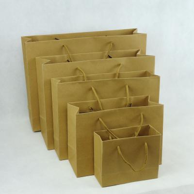 China New Brown Recyclable Creative White Black Paper Gift Wrapping Custom Paper Bag Packaging for sale