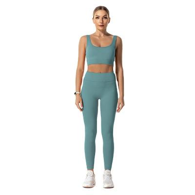 China Breathable Seamless Yoga Suits Nylon Material Custom Design Suits Rib Pattern Women Gym Women Fitness Set for sale