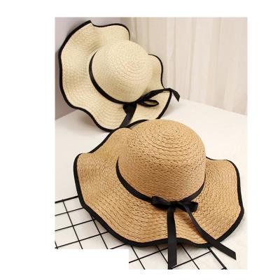 China Wide Picture Stock Women Paper Straw Hat Pattern Fashion Shows Wave Brim Sun Visor Beach Soft Disc Straw Sunhat for sale