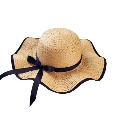 China Wide Picture Stock Women Paper Straw Hat Pattern Fashion Shows Wave Brim Sun Visor Beach Soft Disc Straw Sunhat for sale