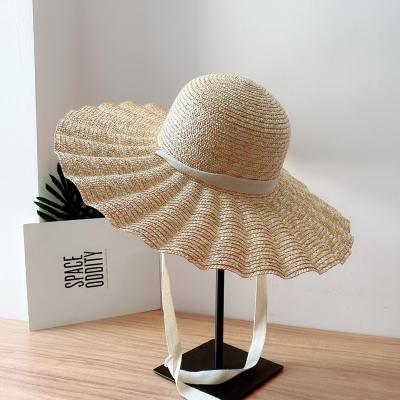 China Image Women's Wheat Straw Hat For Catwalk Fashion Wave Brim Straw Floppy Hat Summer Sun Beach Sun Visor Hat for sale