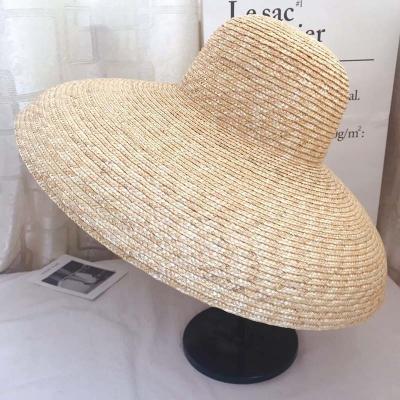 China Wholesale Picture Wheat Straw Hat For Catwalk Fashion Wide Brim Straw Floppy Hat Summer Sun Beach Sun Visor Hat for sale