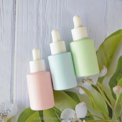 China Macaron Flat Colored Cylinder Shoulder 30ml 50ml Dropper Glass Bottle For Serum Essential Oil for sale