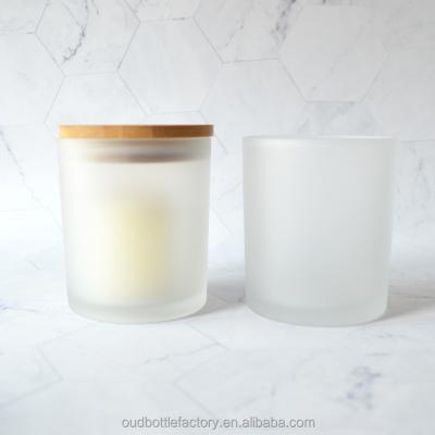 China Wholesale Empty Frosted Glass Home Decor Candle Jar Candle Vessels With Wooden Lid In Bulk for sale