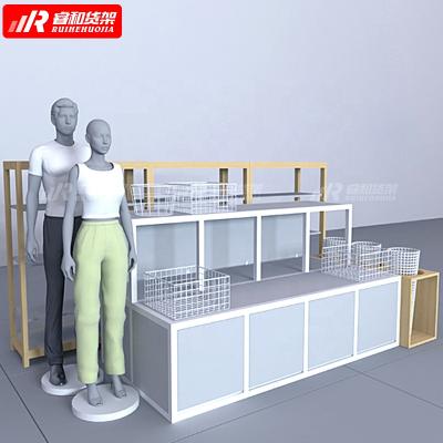 China Retail store display pop kinock downstairs clothes store gray wood laminate store shelves ruihe factory retail shelves for sale