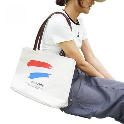 China Fashion Wholesale logo printed large capacity stylish women custom cotton canvas shopping tote bag for sale