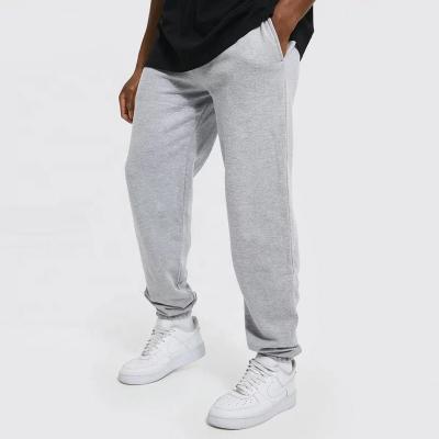 China Anti-Wrinkle Men's Oversized Sports Workable Loose Jogger Men's Empty Gray Sweatpants for sale