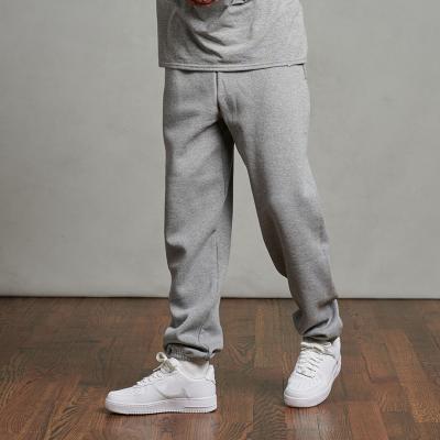 China Anti-Wrinkle OEM Fitness Mens Solid Color Fleece Cotton Mens Oversized Organic Track Pants Joggers for sale