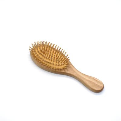 China Hot Selling Amazon Custom Logo Cushion Private Label Eco-Friendly Massage Wooden Oval Hair Brush for sale