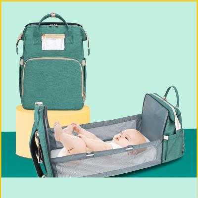 China Hot Selling Amazon 3 in 1 Foldable Diaper Bag Backpack with Changing Portable Baby Station Crib Crib Mummy Bag with USB for sale