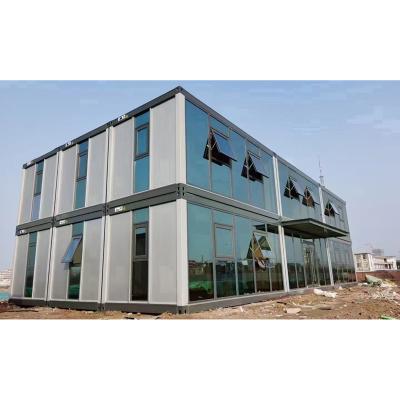 China Contemporary Luxury Well Designed Prefab Glass Container Prefab Offices Curtain Wall Apartment Building for sale