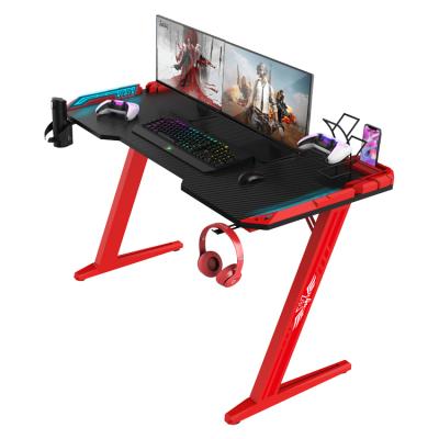 China Stretch Carbon Fiber Red PC Gaming Gaming Desk Z Shaped With RGB Led Lights Computer Desk for sale