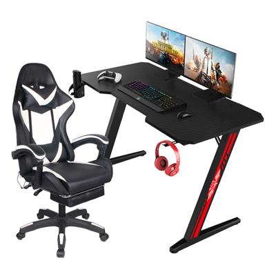 China Customization large 55 inch z shaped carbon fiber gaming extendable desk black computer desk for sale