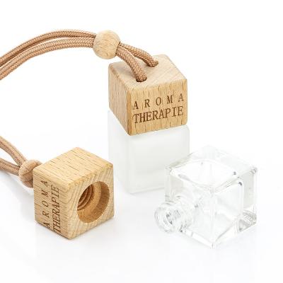 China Square Cosmetic 8ml Empty Hanging Clear Frosted Diffuser Car Perfume Bottle Freshener Bottle With Wooden Cap for sale