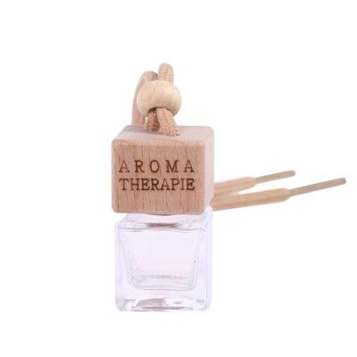 China Cosmetic Custom Logo 8ML Square Shaped Hanging Empty Car Perfume Air Freshener Bottle With Wooden Cap for sale