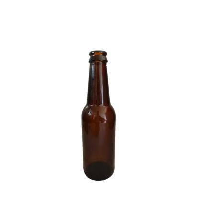 China Wholesale Round Shaped Empty Glass Amber Beer Bottle Beverage 250ml 330ml 500ml With Crown Cap for sale