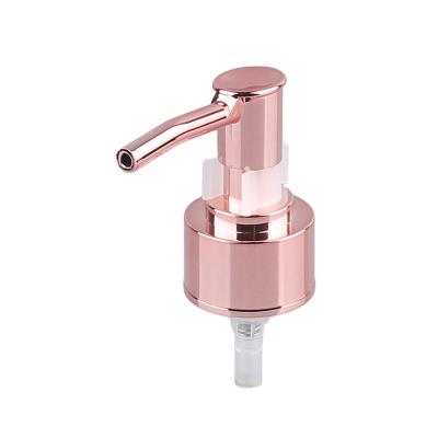 China Professional non puddle supplier 28 410 luxury pink plastic cosmetic bottle UV pump gold ABS lotion pump for sale