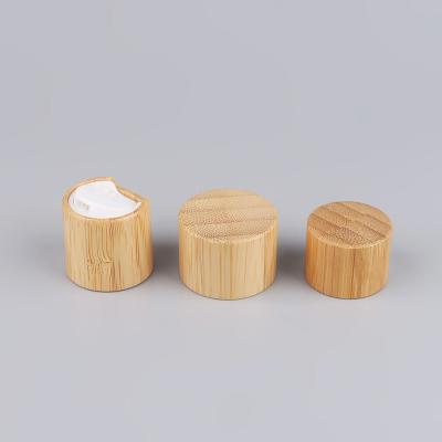 China Non Spill Eco-Friendly Plastic Inside Hand Press Shampoo Lotion Disc Around Bamboo Top Cap Screw-On Lid for sale