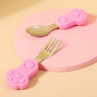 China Eco-freindly design cute baby tableware silicone handle stainless steel baby self spoon and fork feeding set for sale