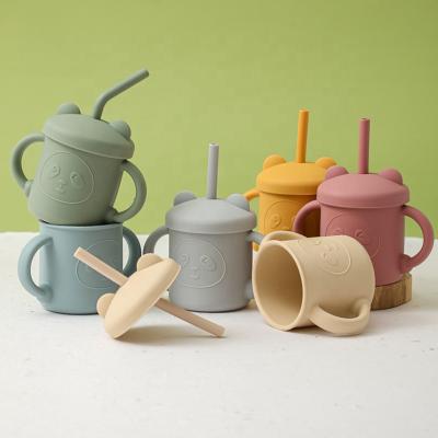 China 2022 New Eco-freindly Bear Design Silicone Baby Milk Cups Toddler Kids Food Grade Silicone Straw Cup With Lid for sale