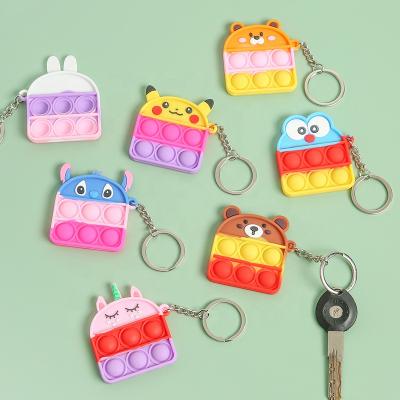 China Silicone Factory Wholesale Customized 2022 Amazon Hot Sale Silicone Funny Cartoon Mini Push Bubble Keychain for sale