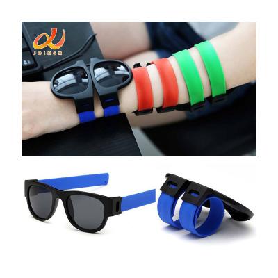 China Custom Fashion Colorful Polarized Collapsable Fashion Logo Sunglasses Shade Folding Clasp Wristband Sunglasses Slap On Sun Glasses for sale